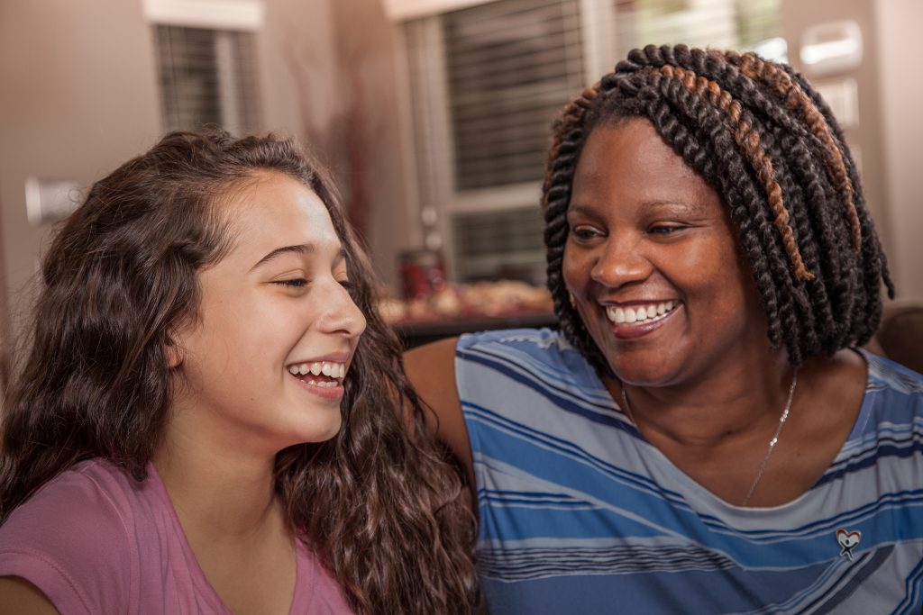 Female advocate with teenage girl.