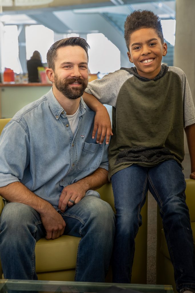 Male advocate with pre-teen boy.